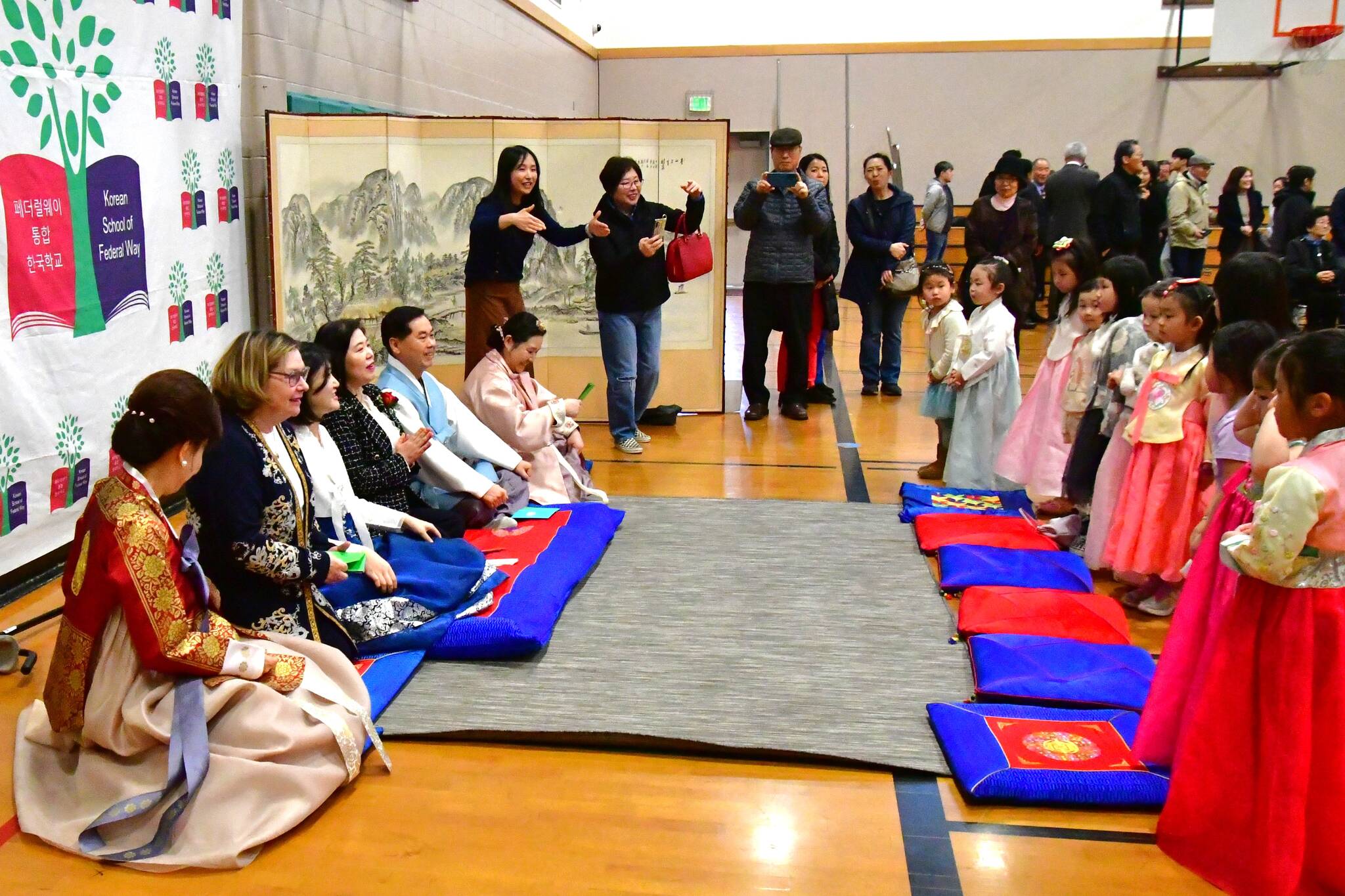 Students get ready to perform Sebae, a deep bow, wishing elders Happy New Year at the Korean School on Feb. 10. Photos by Bruce Honda