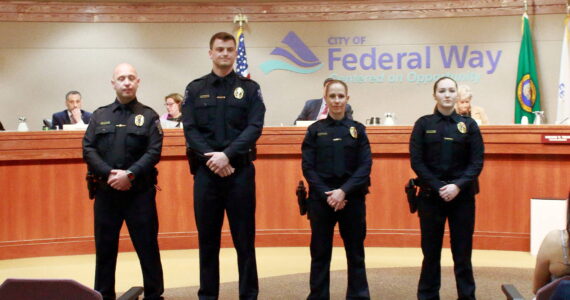 New officers of the Federal Way Police Department: Officer Sergey Peshkov, Officer Troy Petersohn, Officer Carrie Boschetti and Officer Jessie Perry. Photo by Keelin Everly-Lang / The Mirror