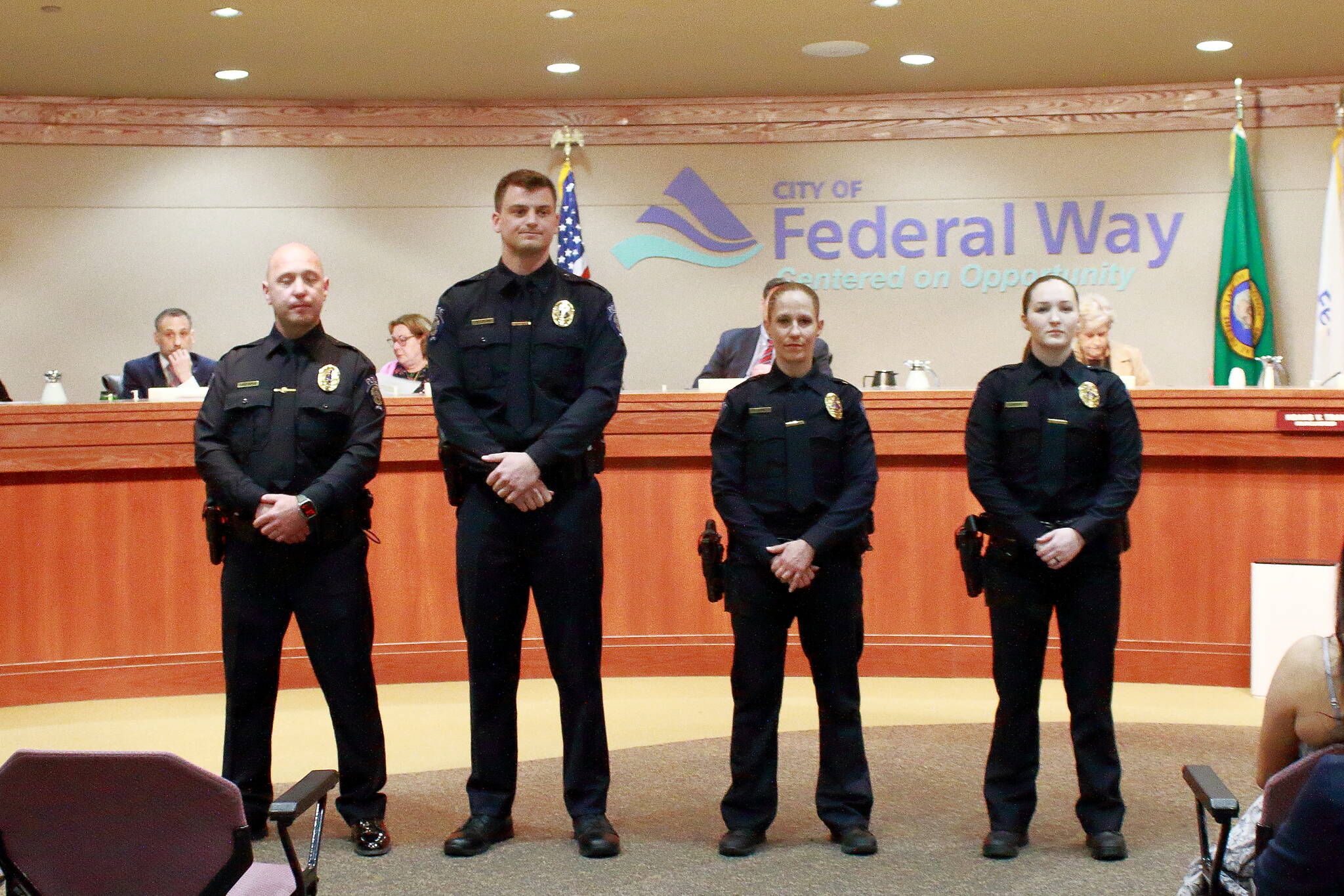 New officers of the Federal Way Police Department: Officer Sergey Peshkov, Officer Troy Petersohn, Officer Carrie Boschetti and Officer Jessie Perry. Photo by Keelin Everly-Lang / The Mirror