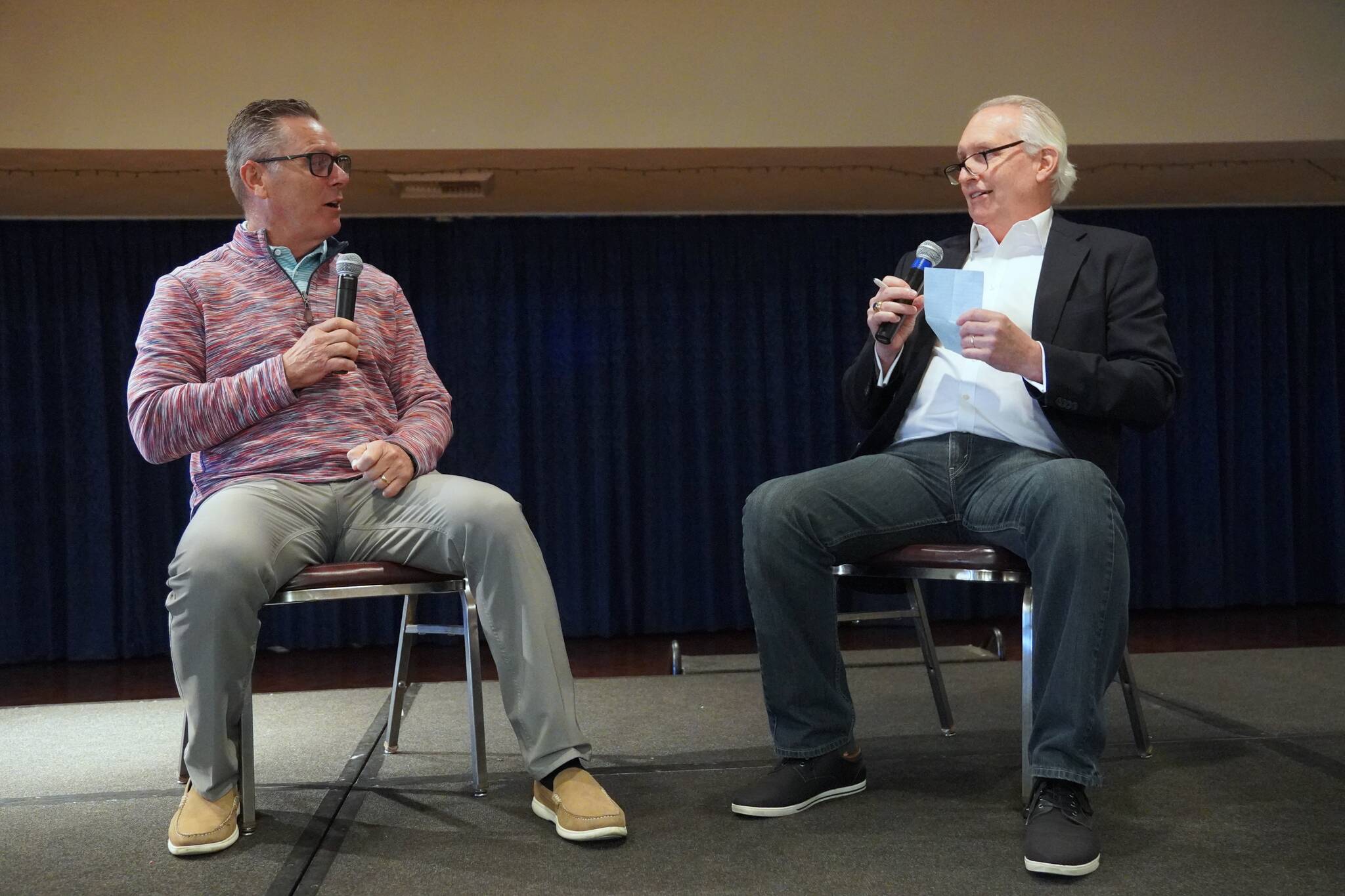 Steve Largent (left) and Steve Raible having a conversation at the Scholar-Athlete Breakfast. Photo By Joshua Solorzano/The Mirror