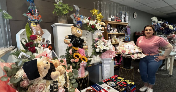 Malena Garces in her shop, Expresalo con Detalles, next to her gift baskets and flowers. The store is located at 1500 South 336th St. in Federal Way. Photo by Joshua Solorzano/The Mirror