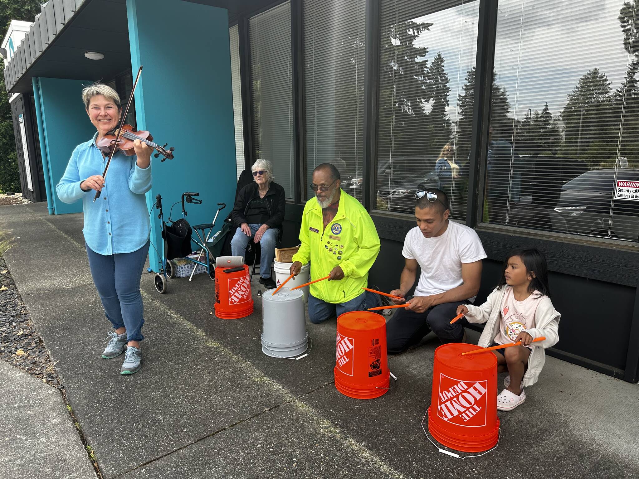 From left: Irina Nikitina, Elna Aki, Raul Baird, Jon Harris and Kailey Harris gathered to play the bucket drums celebrating Make Music Day in 2023. Mirror file photo