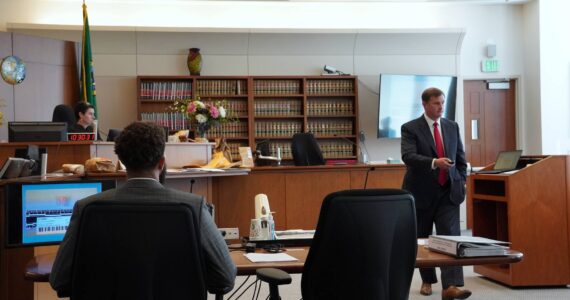 Robert Nelson III at trial while his attorney Tim Lewis delivers closings statements. Photo by Joshua Solorzano/The Mirror