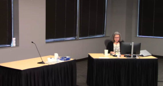 Marcine Anderson reading the interrogatories of the jurors. (Screenshot)