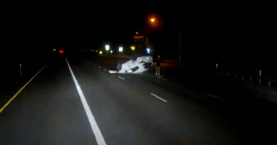 The driver of the Kia Sportage outside of his vehicle following the crash. (Photo from the video released by WSP)