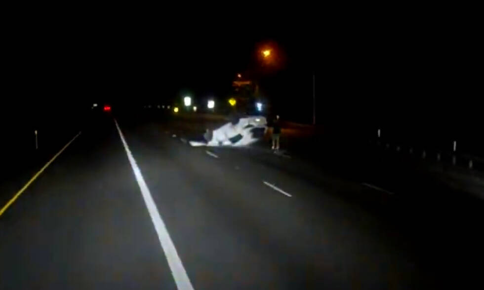 The driver of the Kia Sportage outside of his vehicle following the crash. (Photo from the video released by WSP)