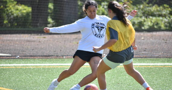 Decatur softball shortstop Kahea Sharpe (white) is giving soccer a go this year. Ben Ray / The Mirror