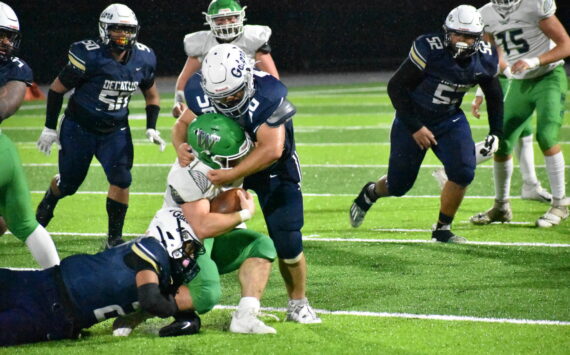 Decatur’s Ben Ferrell takes down the Woodinville running back. Ben Ray / The Mirror