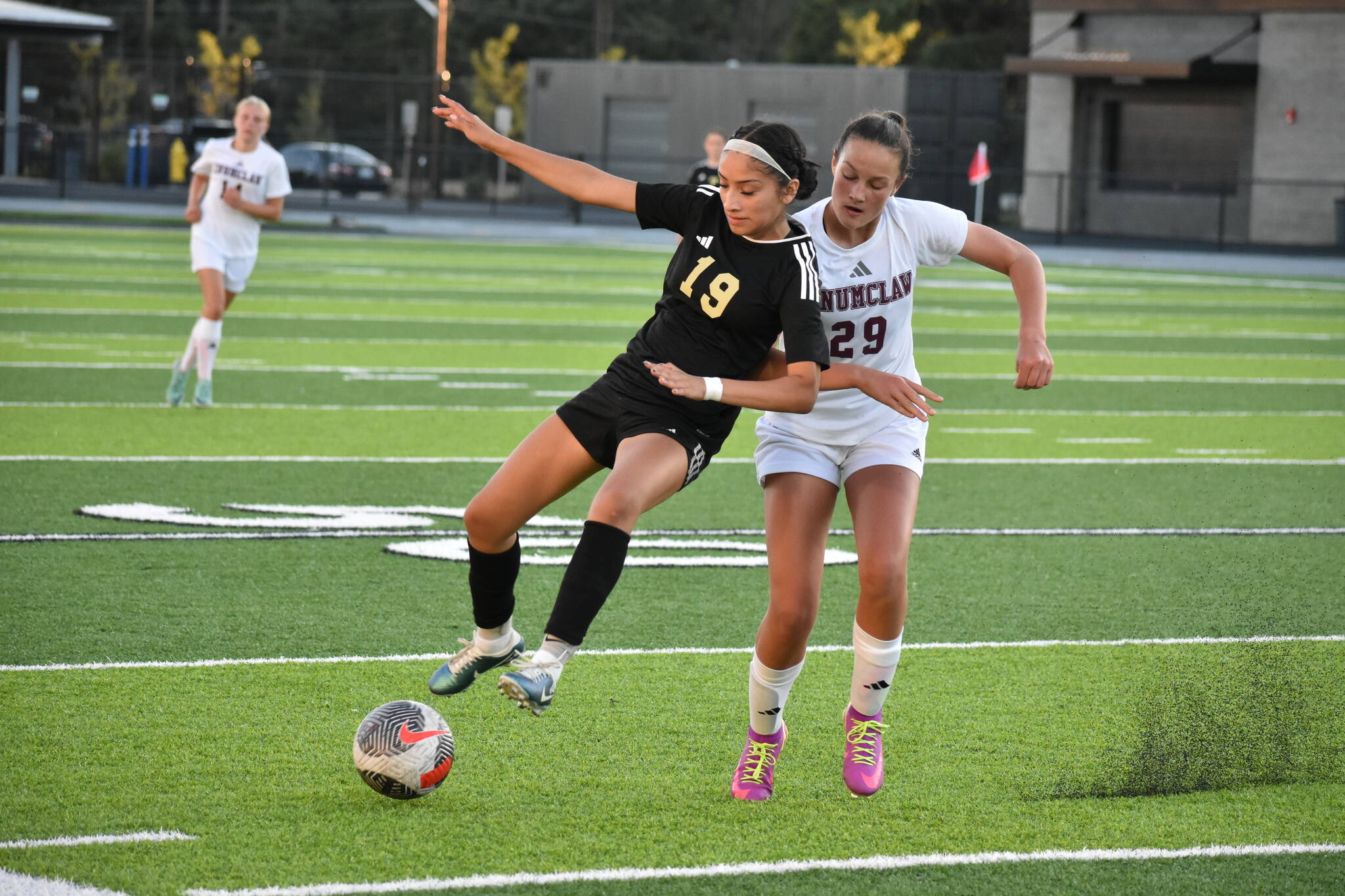 Senior Alexa Galmichi for Decatur fights for possession. Ben Ray / The Mirror