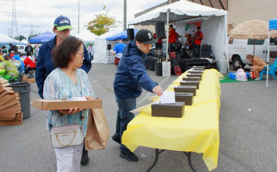 Guests voted for their favorite restaurant at The Taste of Federal Way in this photo from the 2023 event. The event concludes with awards given by judges as well as for People’s Choice, based on votes dropped in these boxes throughout the day. File photo