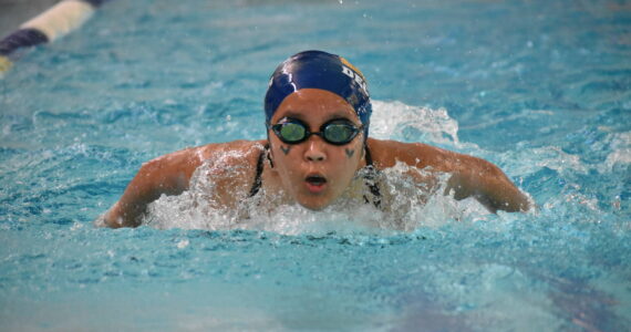 Decatur swimmer doing the breaststroke during the IM relay. Ben Ray / The Mirror