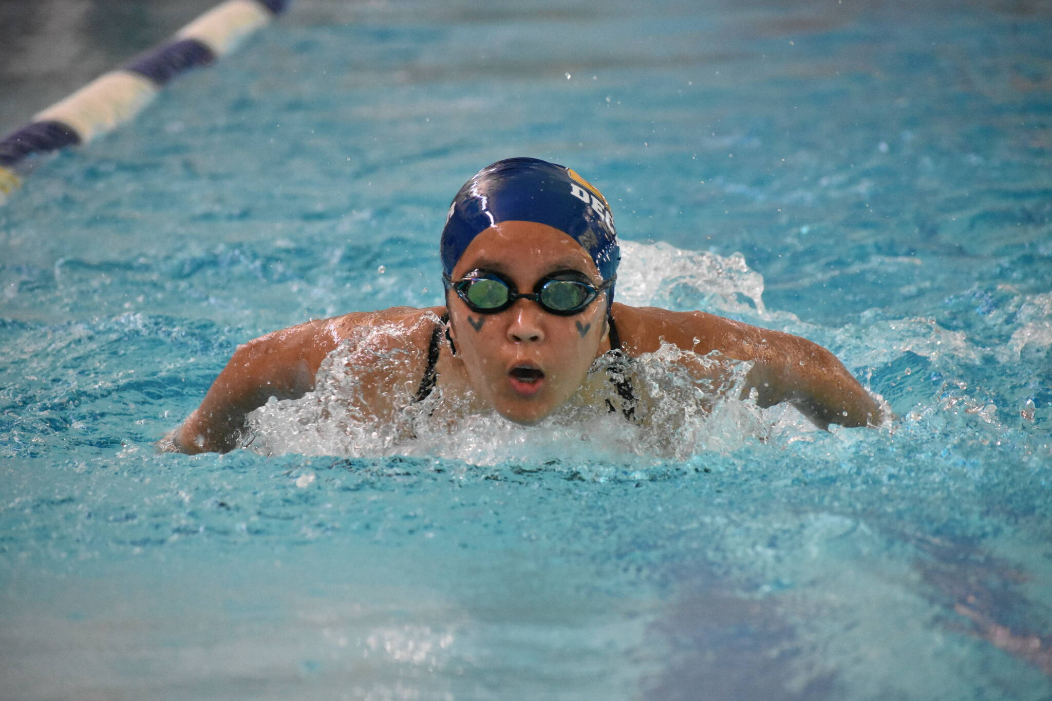 Decatur swimmer doing the breaststroke during the IM relay. Ben Ray / The Mirror