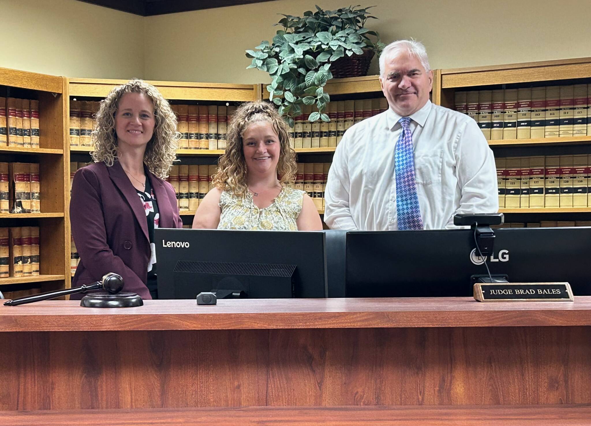 Pictured left to right: Stacie Scarpaci, Ashley Pfaff, and Judge David Larson. Courtesy photo