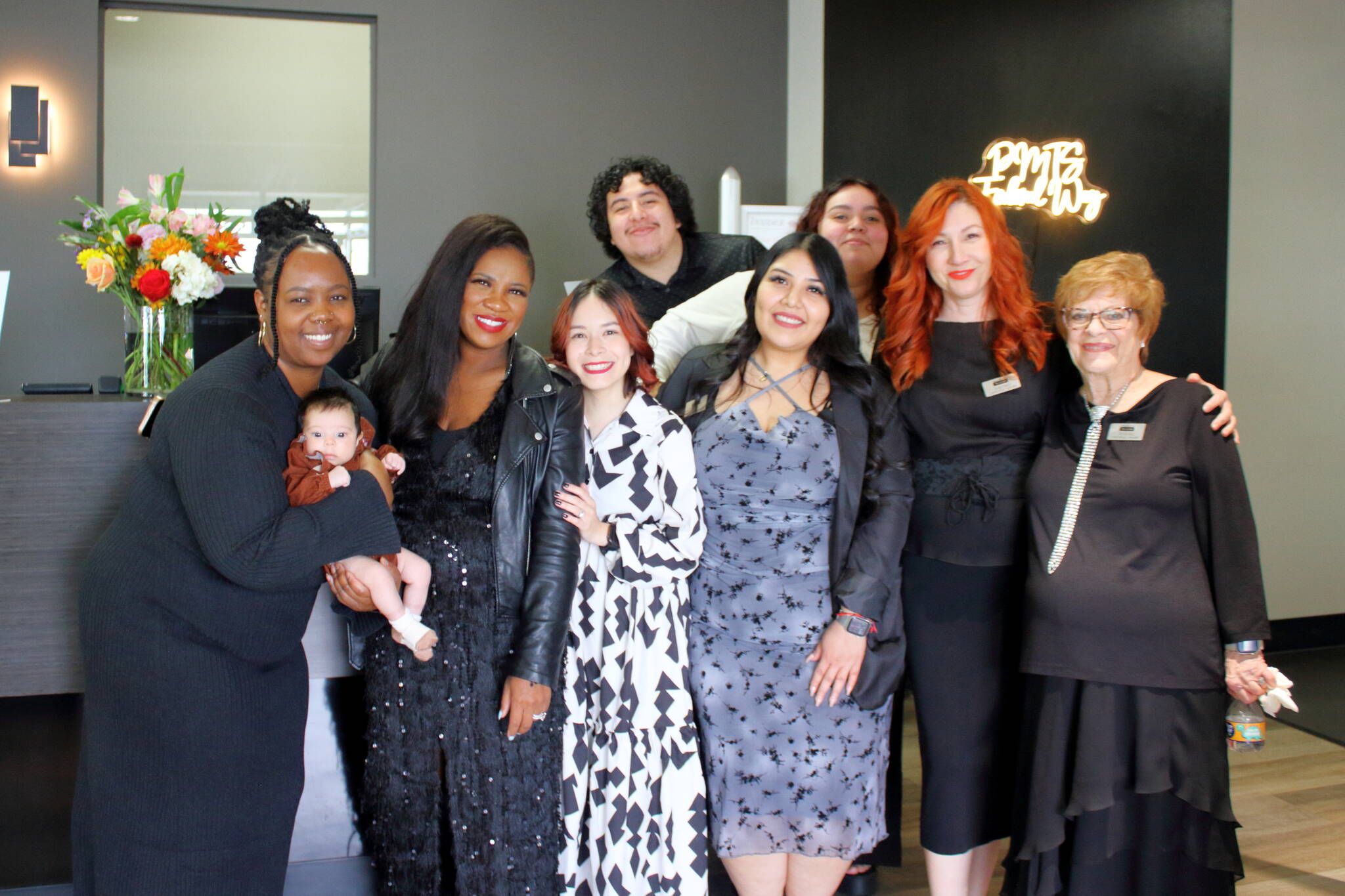 From left to right: Ka’Shayla Jewell (Core Learning Leader), Chara Howell (Learning Leader), Susana Bravo (Learning Leader), Juan Vazquez (Student), Edith Mercado-Antunez (Sales and Operations Leader of Federal Way), Janeth Gomez (Student), Gabriela Calin (Learning Leader), Rhonda Young (Learning Leader) at the grand opening event for Paul Mitchell the School. Photo by Keelin Everly-Lang / The Mirror