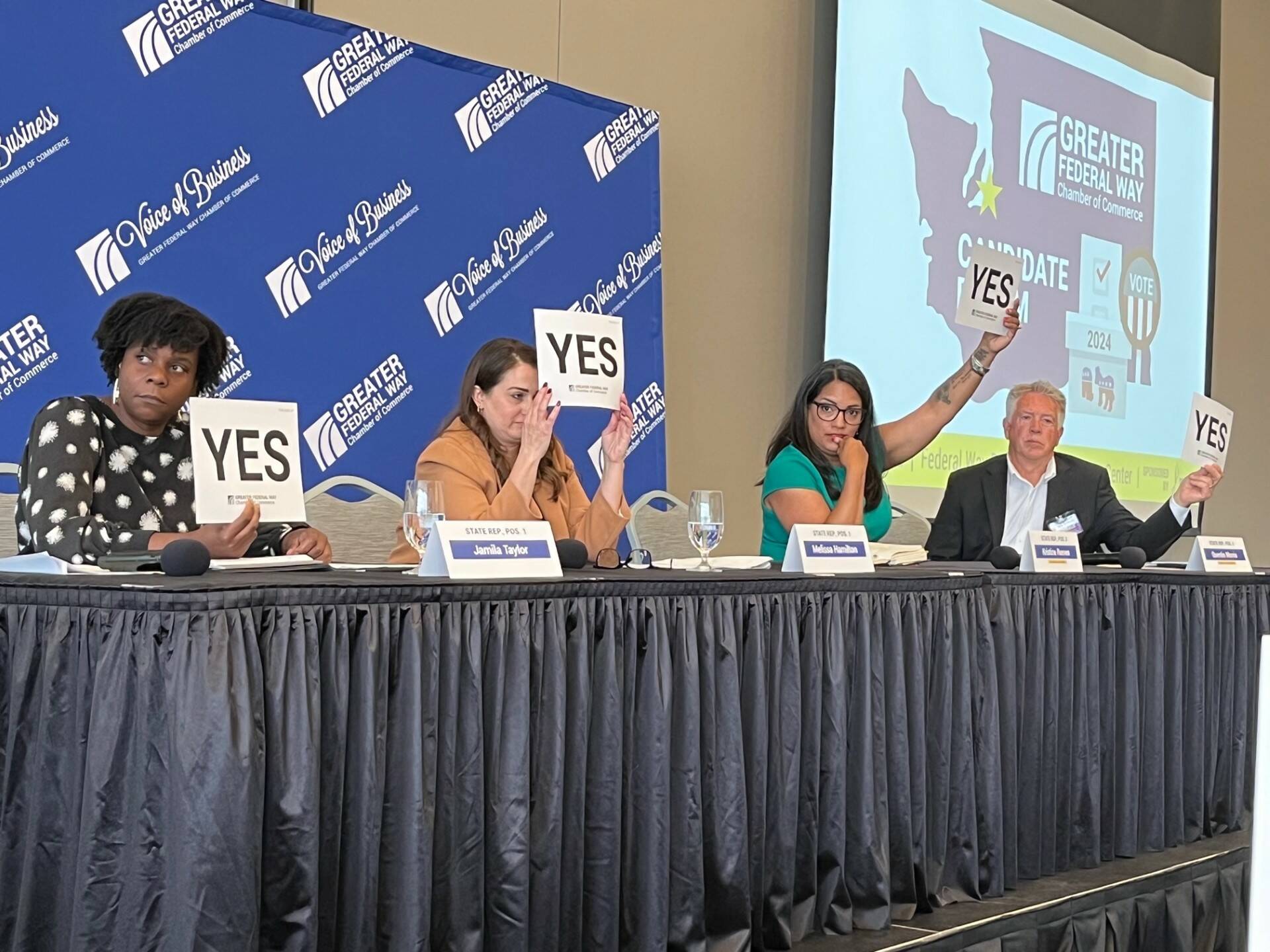 The Greater Federal Way Chamber of Commerce hosted a forum for 30th Legislative District candidates during its membership luncheon Oct. 2. Pictured left to right: Jamila Taylor, Melissa Hamilton, Kristine Reeves and Quentin Morris answer a “lightning round” question. The candidates will appear in another forum at 6 p.m. Oct. 8 at the Federal Way Community Center that’s free and open to the public. Photo by Andy Hobbs/The Mirror