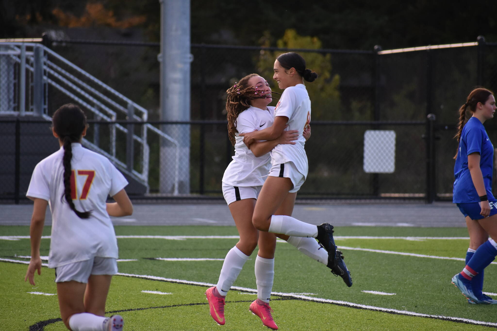 Jazmyne DuBose and Athena Amor Katsaros celebrate a goal against Federal Way. Ben Ray / The Mirror