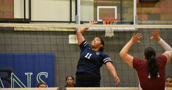 Kiana Smiley goes for the spike against Kentlake. Ben Ray / The Mirror