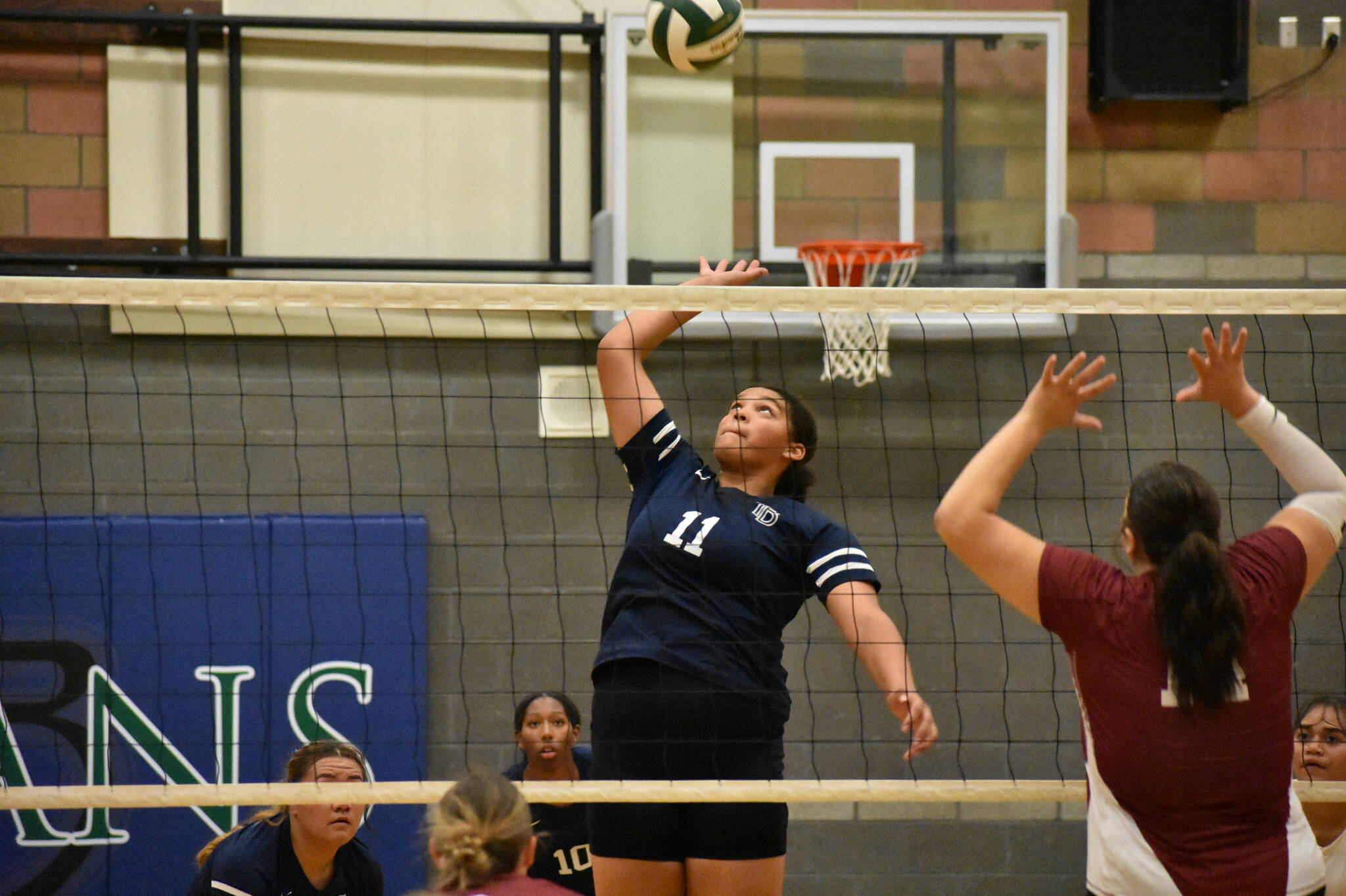 Kiana Smiley goes for the spike against Kentlake. Ben Ray / The Mirror