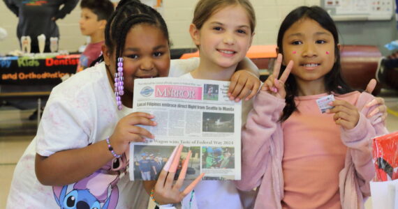 Adelaide students stopped by the Mirror’s table to decorate notebooks and learn about a career in journalism at the career fair this year. Photo by Keelin Everly-Lang / the Mirror