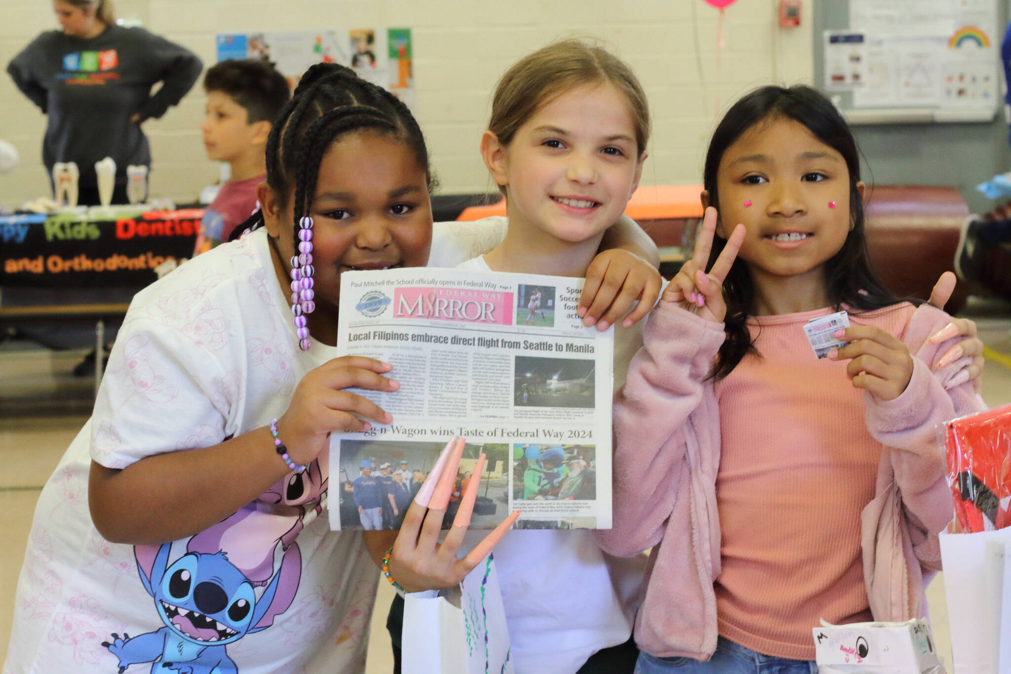 Adelaide students stopped by the Mirror’s table to decorate notebooks and learn about a career in journalism at the career fair this year. Photo by Keelin Everly-Lang / the Mirror