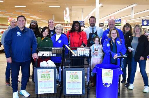 A scene from the Mayor’s Month of Concern Food Drive on Oct. 12 where donations were collected at Fred Meyer in Twin Lakes and Grocery Outlet in Dash Point. Photo by Bruce Honda