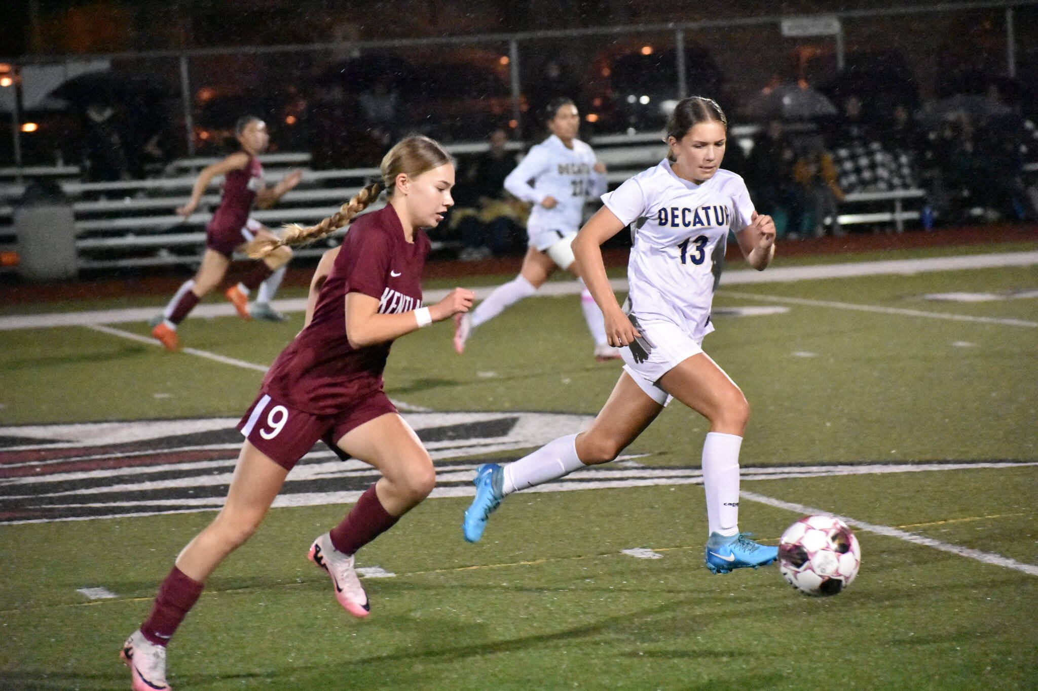 Maya Rainey chases down a Kentlake player in the first half at Kentlake High School. Ben Ray / The Mirror