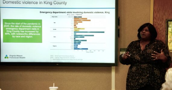 Cora Wyche presenting the King County Community Health needs. Photo by Joshua Solorzano/The Mirror