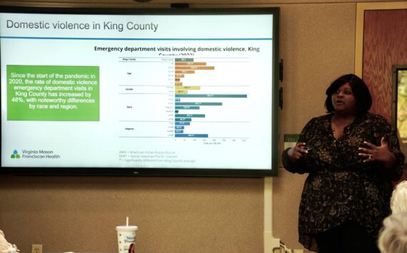 Cora Wyche presenting the King County Community Health needs. Photo by Joshua Solorzano/The Mirror