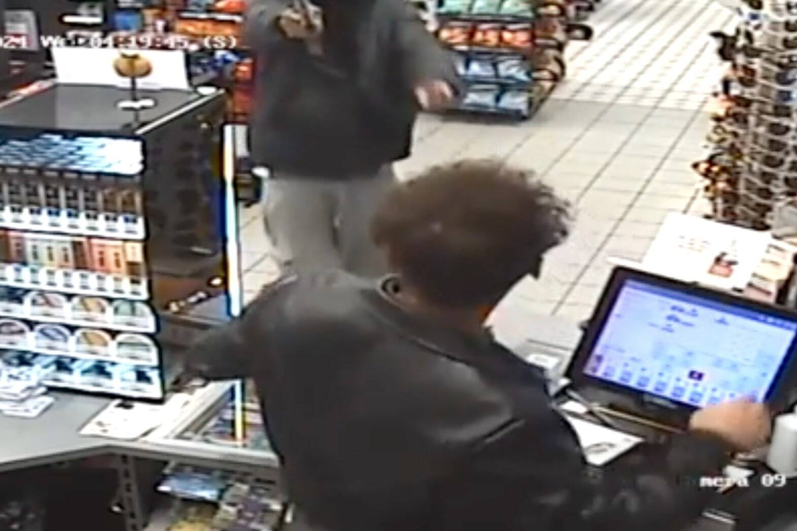 Screenshot from the surveillance footage showing the Oct. 9 armed robbery of a 76 gas station in Federal Way. (Screenshot)