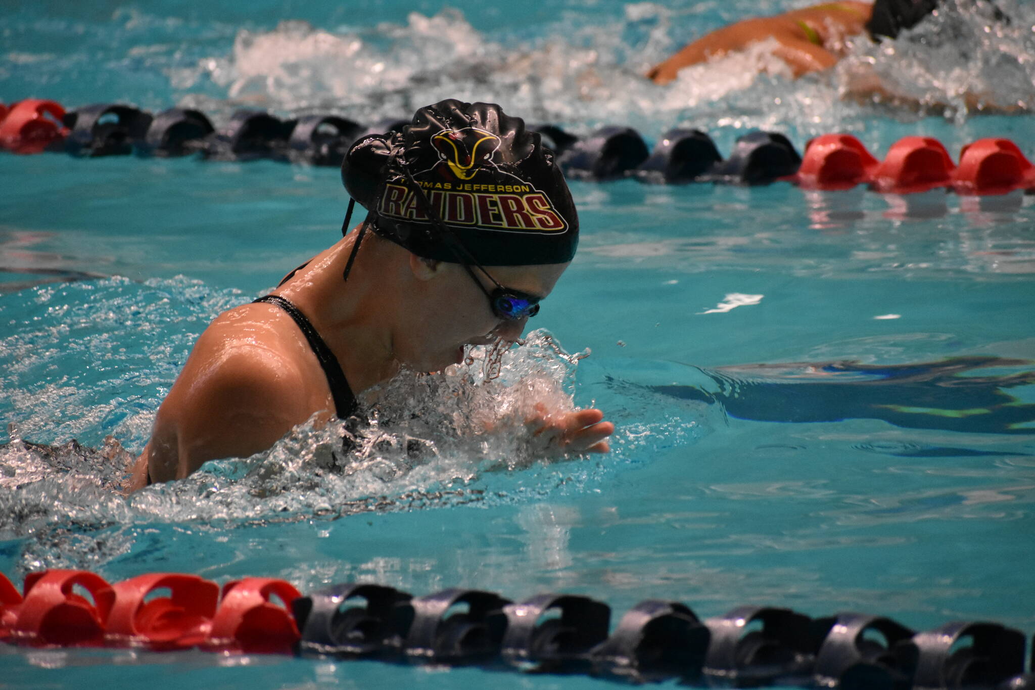 Thomas Jefferson swimmer swims in breaststroke section of the medley relay. Ben Ray / The Mirror