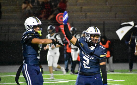 Decatur defenders Jasonni Prum (right) and Sefa Leapai celebrate a sack. Ben Ray / The Mirror