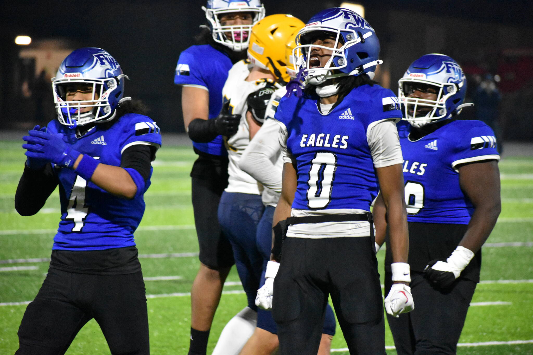 Federal Way’s defense was fired up after forcing a fumble against Ferndale’s offense. Ben Ray / The Mirror