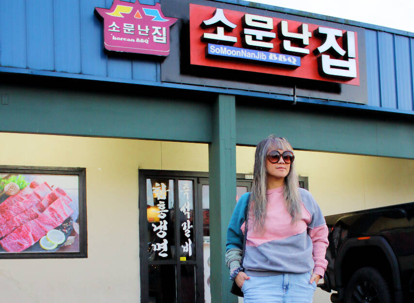 Hanisa Henderson is a Federal Way local who started blogging about food in town to connect with others over delicious food and to put a spotlight on the food scene. Here she is in front of So Moon Nan Jib in Federal Way. Photo by Keelin Everly-Lang / the Mirror.