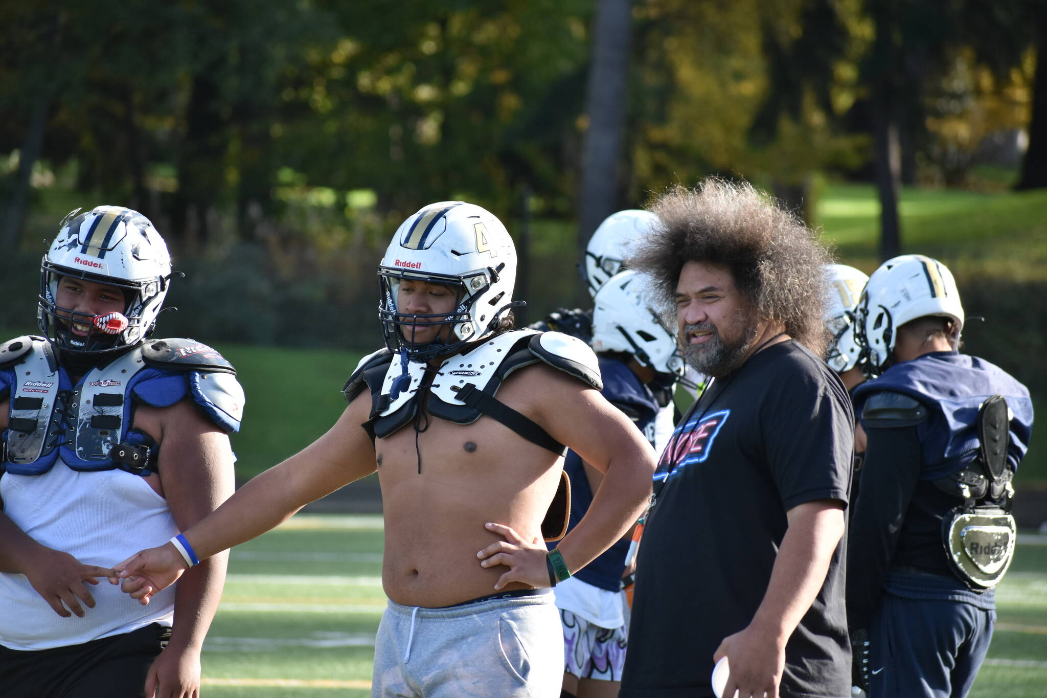 Head Coach Matt Vaeena (right), Jas Leonardo Kereti (middle) and teammates at practice. Ben Ray / The Mirror