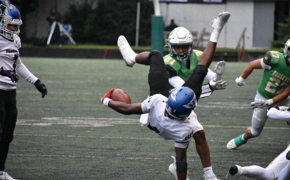 Federal Way junior Zamarie Tellez gets tackled by Roosevelt in the opening round of the state tournament. Ben Ray / The Mirror