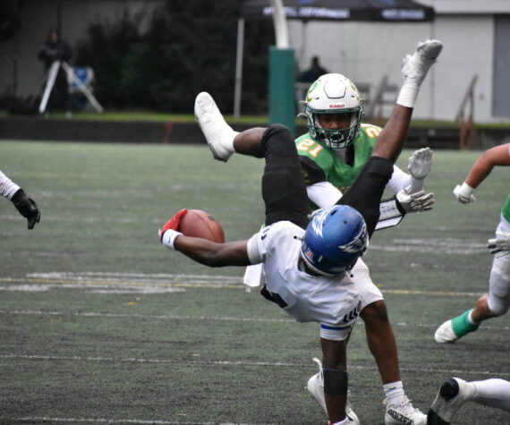 Federal Way junior Zamarie Tellez gets tackled by Roosevelt in the opening round of the state tournament. Ben Ray / The Mirror