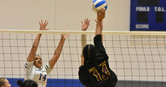 Thomas Jefferson senior Anelia Fatuesi tries to beat a pair of Eagle blockers. Ben Ray / The Mirror