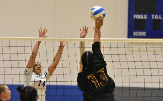 Thomas Jefferson senior Anelia Fatuesi tries to beat a pair of Eagle blockers. Ben Ray / The Mirror