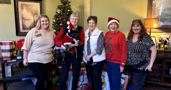 Rachel O’Reilly from Life Care Center, Maxine Ranta, Diane Goss, Penny Merriman and Carrie Asselin working together to brighten the holidays for everyone. Photo provided by Debbie Angel.