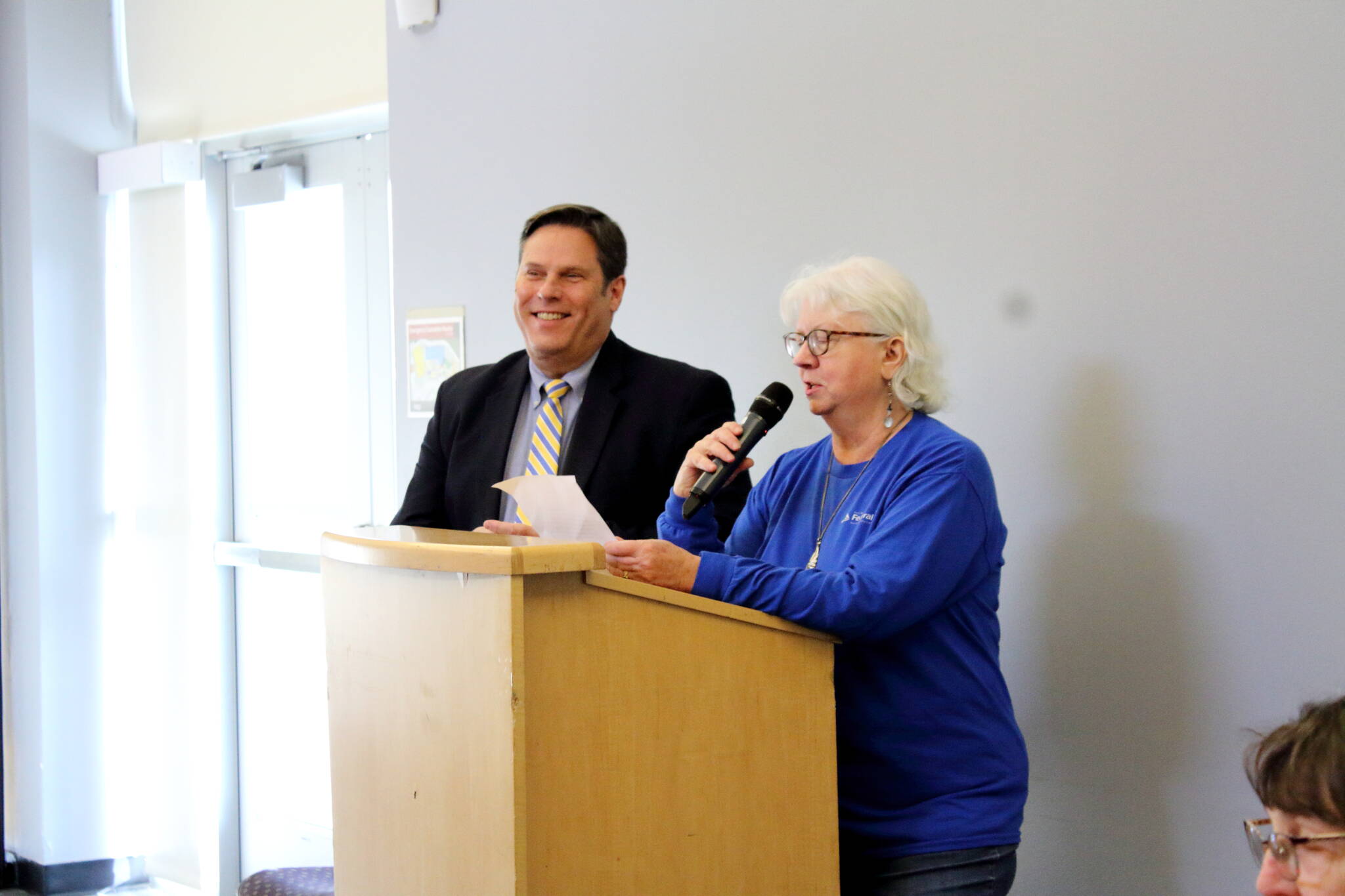 Federal Way Senior Commission member Lana Bostic introduces Federal Way Mayor Jim Ferrell as the guest speaker at their monthly Senior Commission Connections event on Dec. 18 at the Federal Way Community Center. Photo by Keelin Everly-Lang / the Mirror