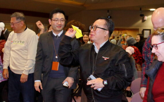 The future Hanwoori Garden was among topics at the quarterly gathering of the local Korean community Dec. 17 at Federal Way City Hall. The evening ended with colorful paper airplanes launched at the front of the room, each with a message written on it with people’s hopes for the Hanwoori Garden. Photo by Keelin Everly-Lang / the Mirror