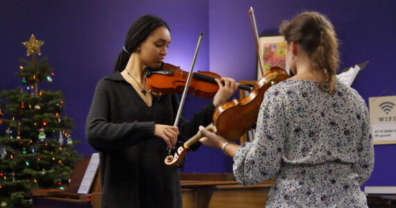 Key to Change student Eden Pawlos receives a private lesson from Seattle Symphony violinist Ilana Zaks at the Renton studio. Photo by Keelin Everly-Lang / the Mirror