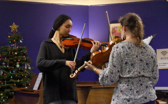 Key to Change student Eden Pawlos receives a private lesson from Seattle Symphony violinist Ilana Zaks at the Renton studio. Photo by Keelin Everly-Lang / the Mirror