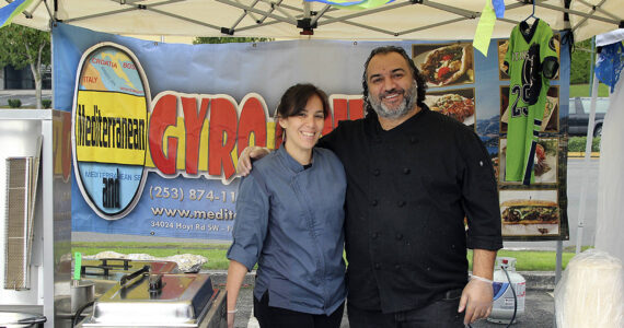 Mediterranean Gyro Grill owner Jay Barbour, right, and his restaurant manager pictured at the Taste of Federal Way in 2019. File photo