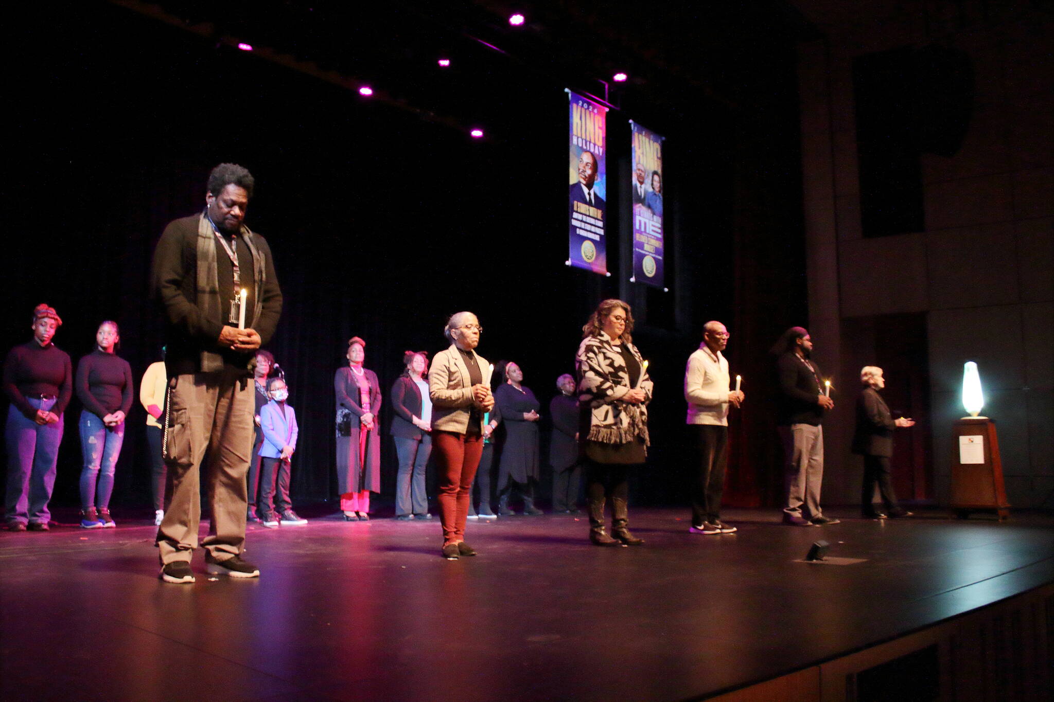 Federal Way community members are honored by carrying a torch to light the community flame during the MLK Day Celebration held Jan. 15, 2024, at the Federal Way Performing Arts and Event Center. Photo by Keelin Everly-Lang / The Mirror.